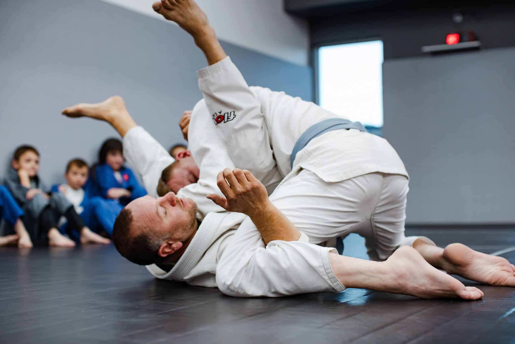 Elevated Martial Arts Students in gi Grappling