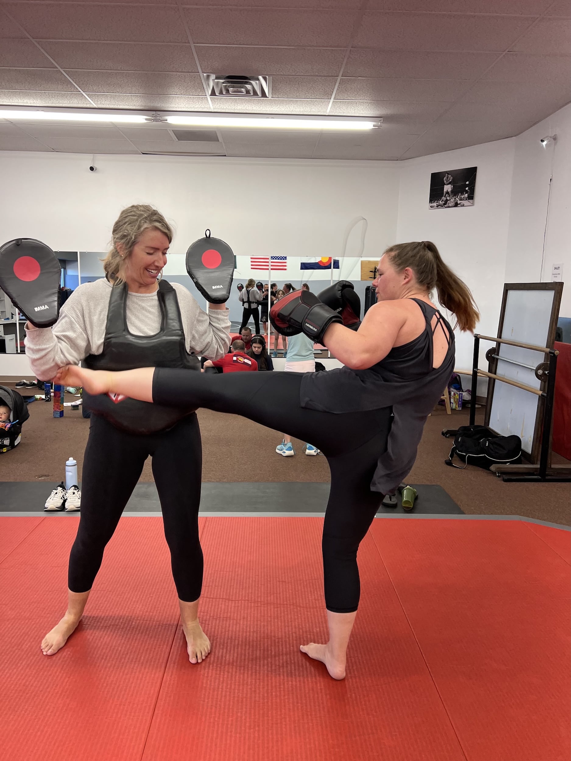 Elevated Martial Arts Students Kickboxing