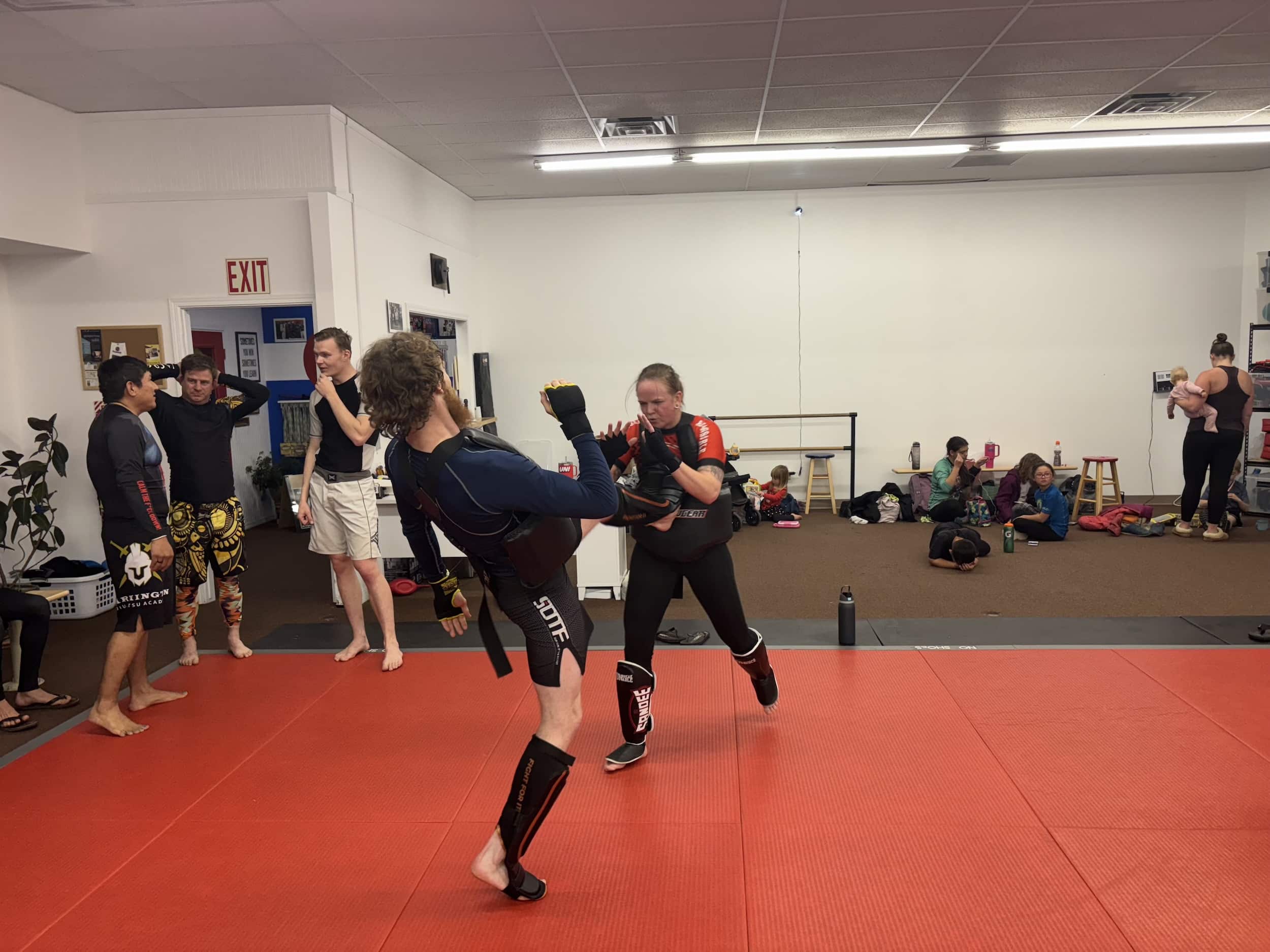 Elevated Martial Arts Students Grappling