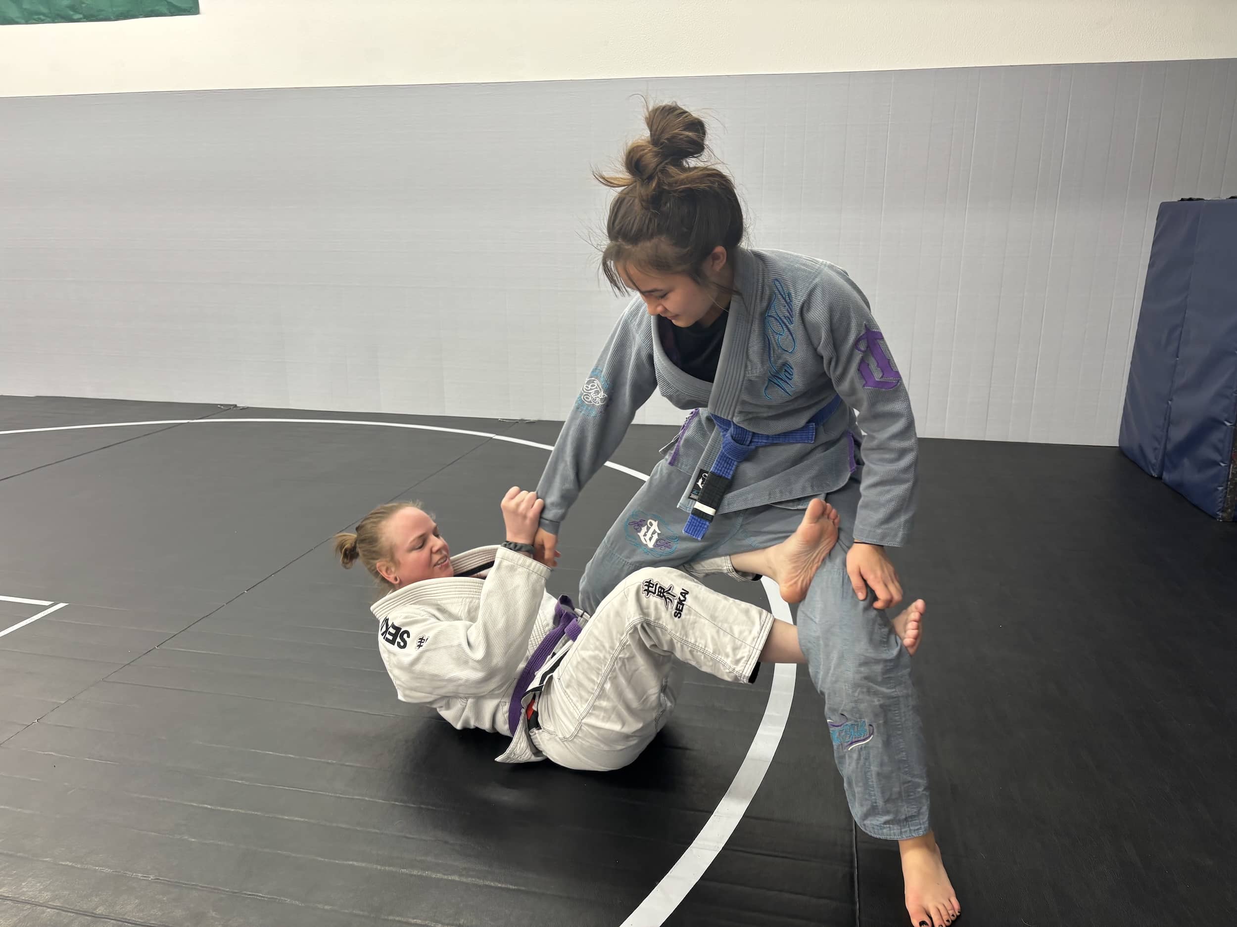 Elevated Martial Arts Students in gi Grappling