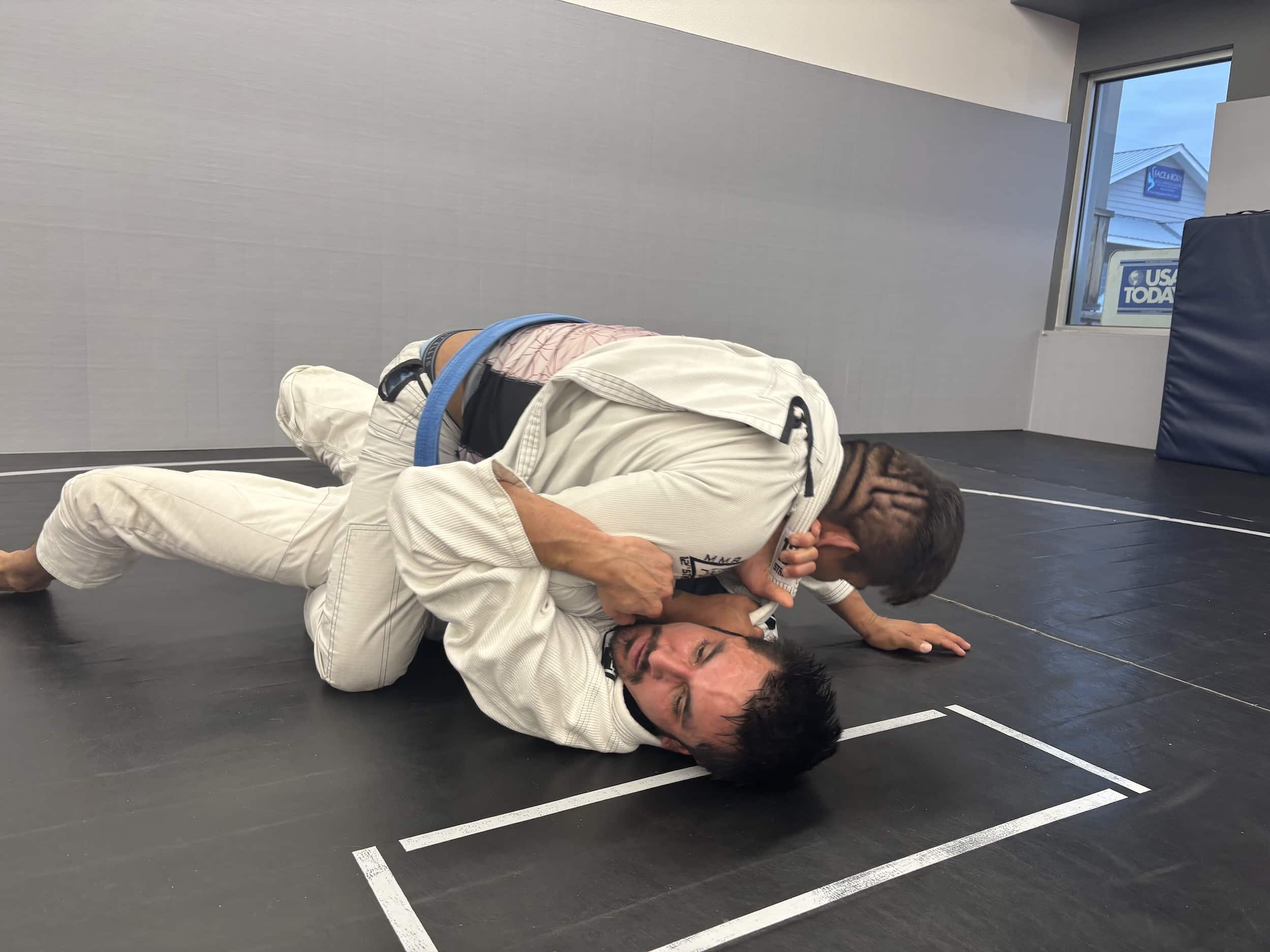 Elevated Martial Arts Students in gi Grappling